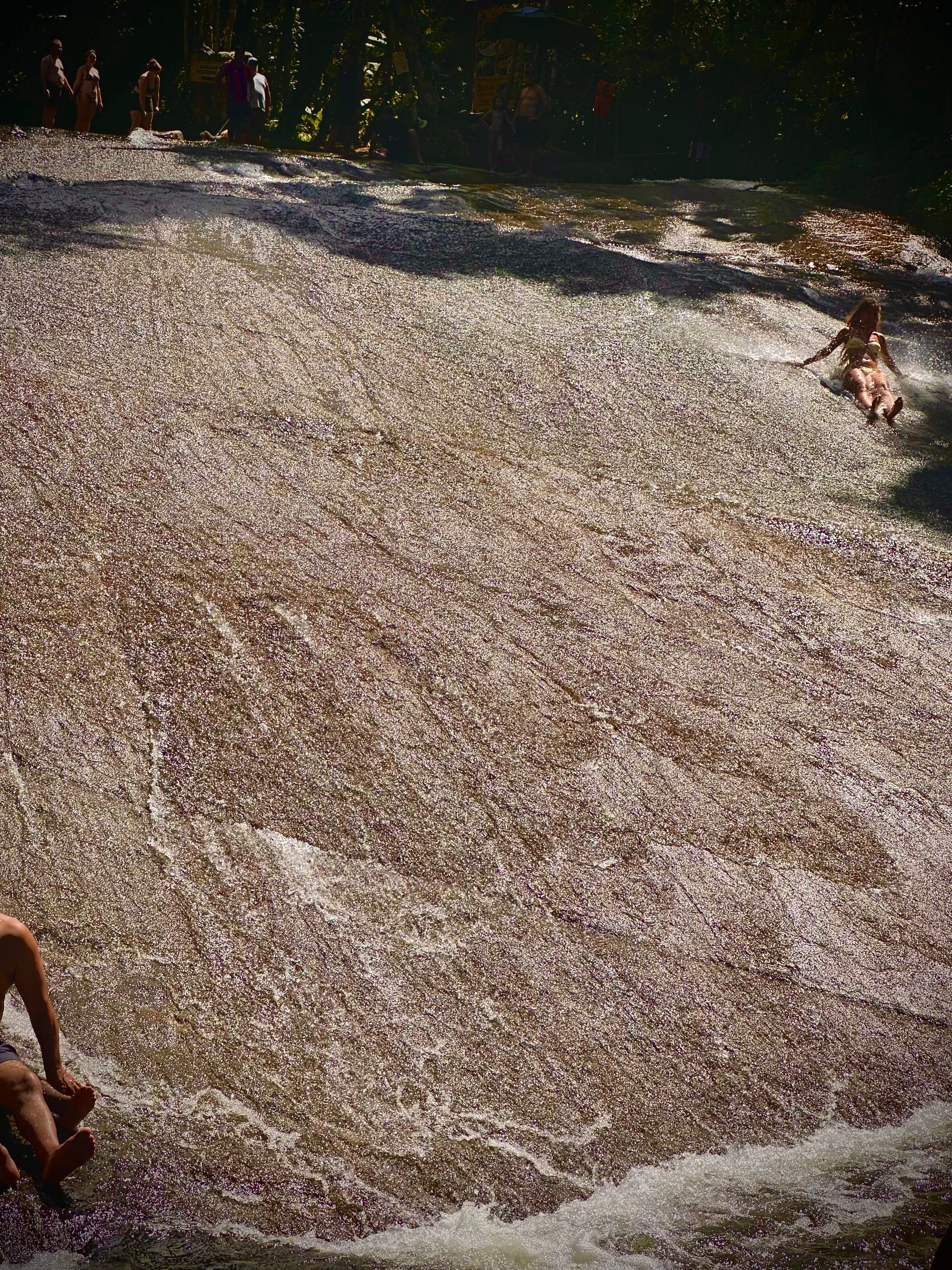 Cachoeira do Tobogã's natural rock slide is one of Paraty's most memorable experiences.